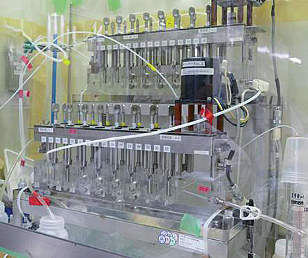 Fig.4-4  Mixer-settler extractors in a fume hood